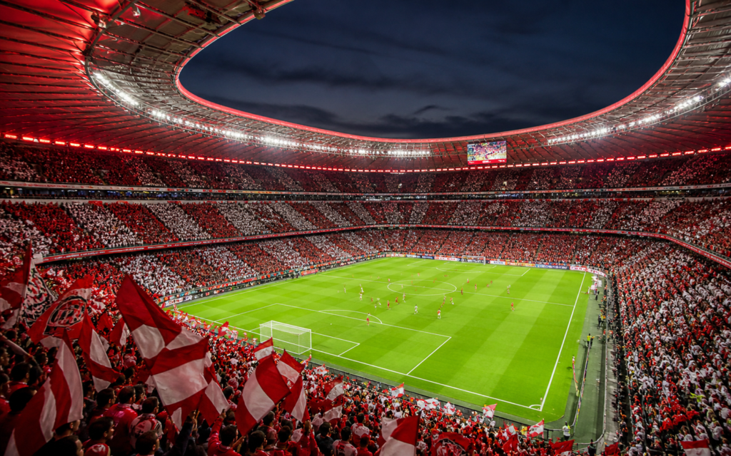 Sân vận động Bundesliga rực lửa trong ngày thi đấu, thể hiện bầu không khí cuồng nhiệt đặc trưng của bóng đá Đức 
